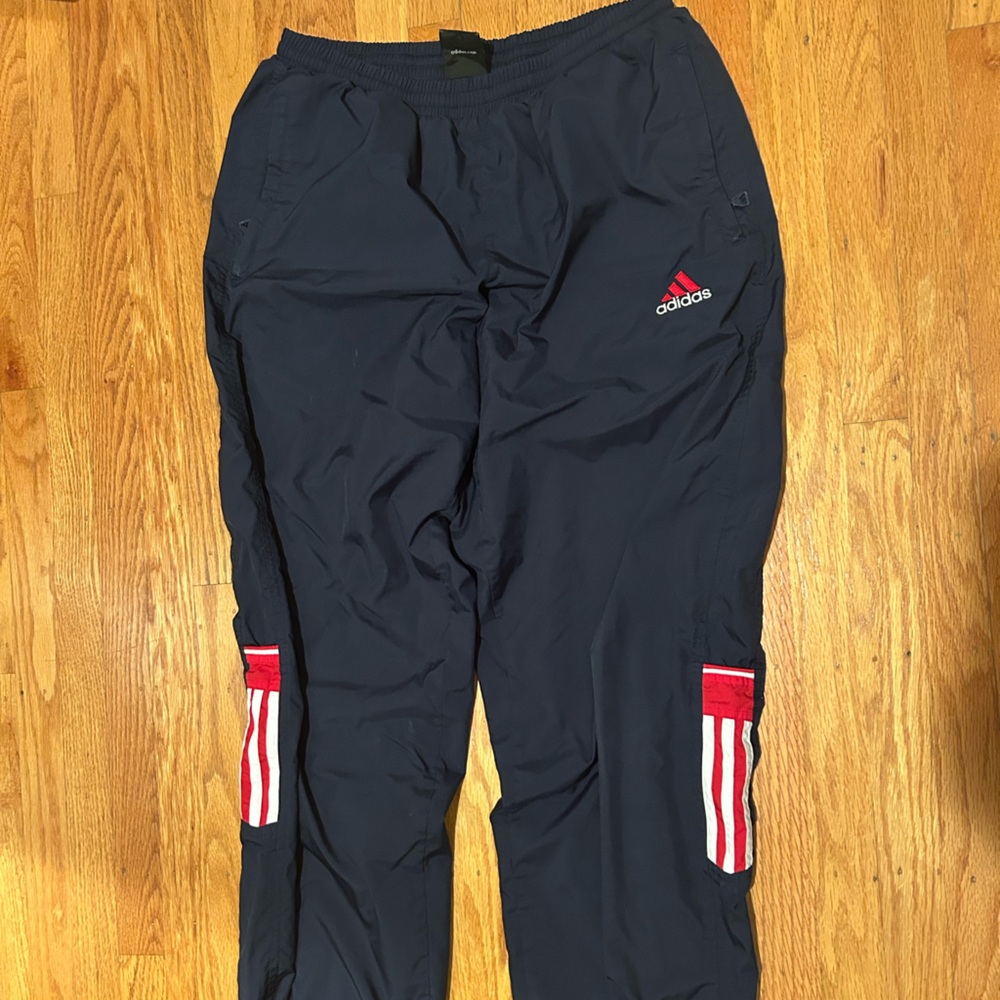 Adidas navy blue track pants with red stripes Size L